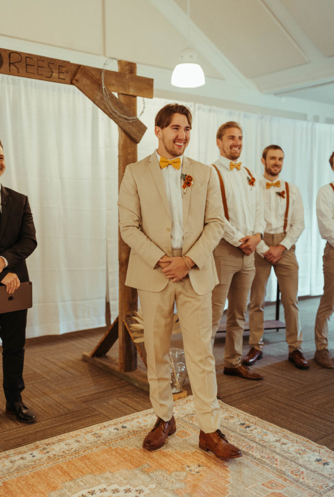 grooms reaction to bride walking down the aisle